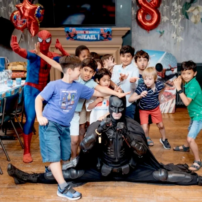 Superhero party entertainers in north London doing the box splits