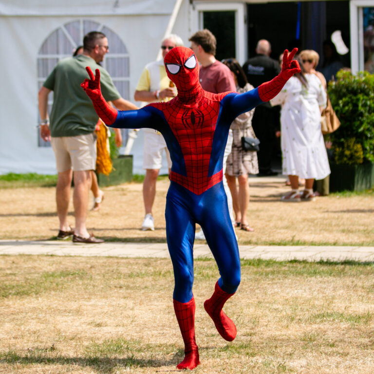 Walkabout entertainer at a town fair in Haringey London